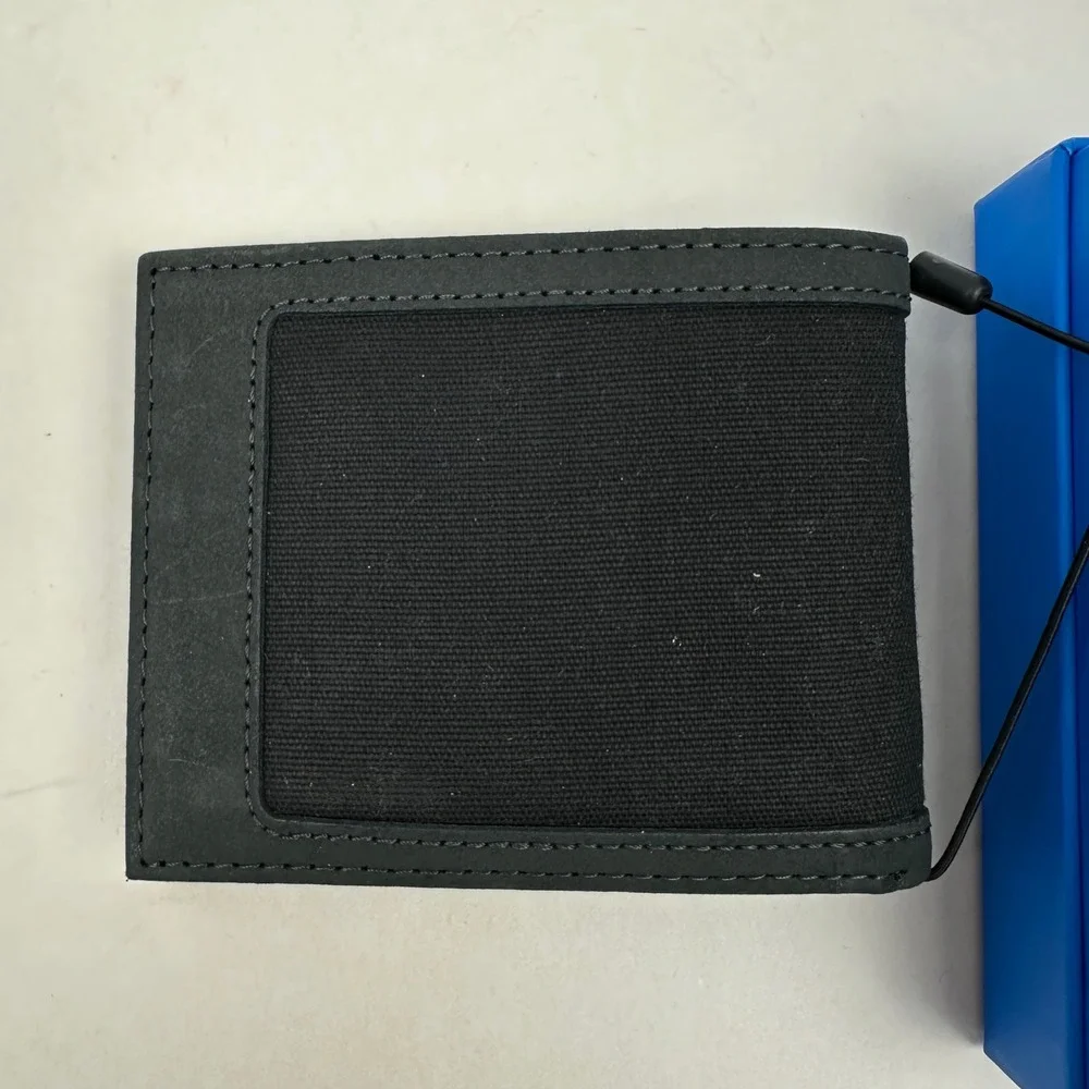 Columbia Mens Black Leather Bifold Wallet RFID Blocking Canvas Inlay Card Holder